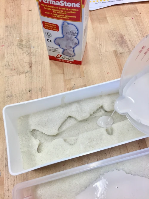 Pour PermaStone into a mold created with InstaMold to create a casting of a fish for three-dimensional under the sea art.